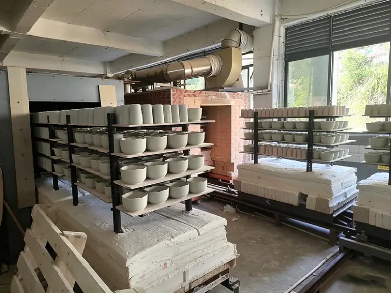 High temperature kiln firing ceramic products at TYY china factory, transforming greenware into durable vitrified porcelain