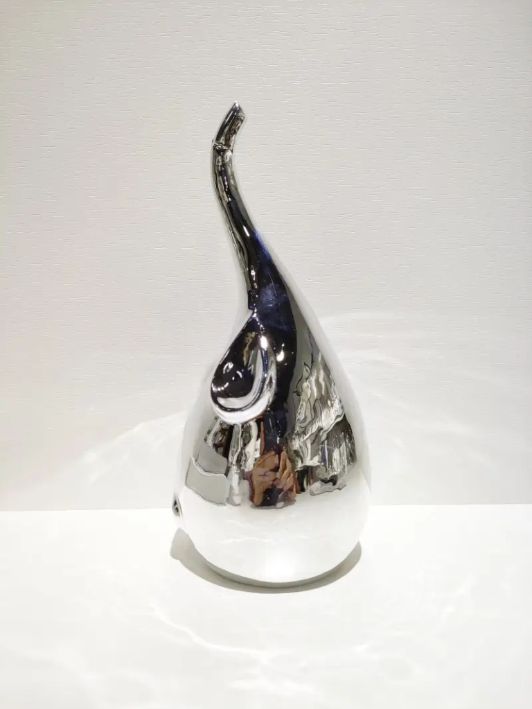 064D elephant ceramic decorative figurine with electroplated silver surface effect and artistic sculptural design