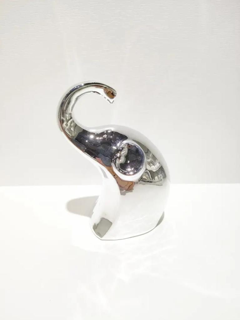 066D curved elephant ceramic decorative figurine with electroplated silver surface effect and unique artistic form