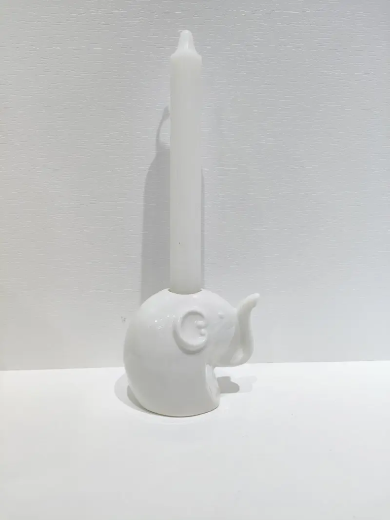067D elephant ceramic candle holder figurine with glossy white finish combining decorative design and candle function