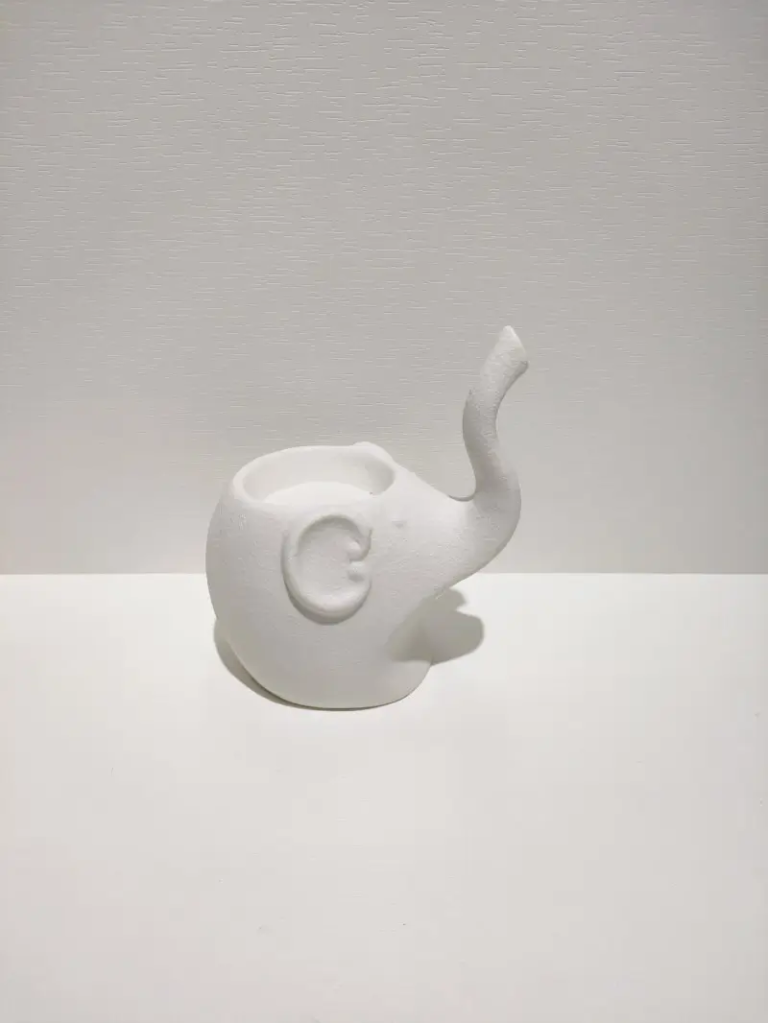 068D sitting elephant ceramic decorative figurine with matte white texture and soft minimalist style