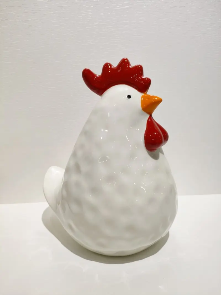 111D White chicken ceramic ornament with a rounded body and raised textured surface for Easter decoration.