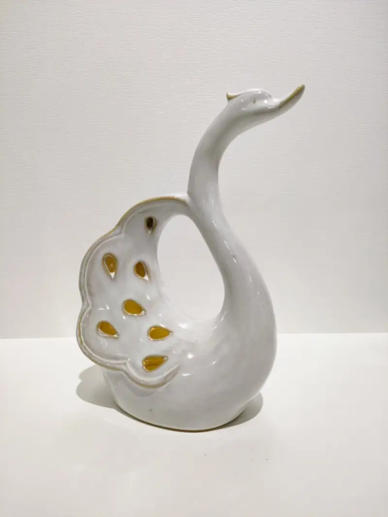 121D Swan Ceramic Bowl featuring wing-shaped design with gold accent details.