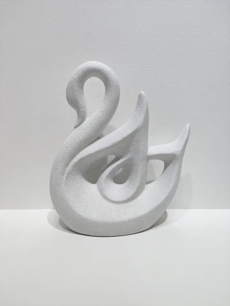126D Swan Ceramic Form in textured matte black finish with modern minimalist shape.