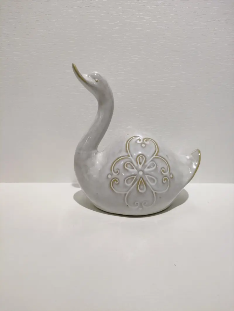 127D Swan Ceramic Form in textured matte white finish with embossed heart pattern detail.