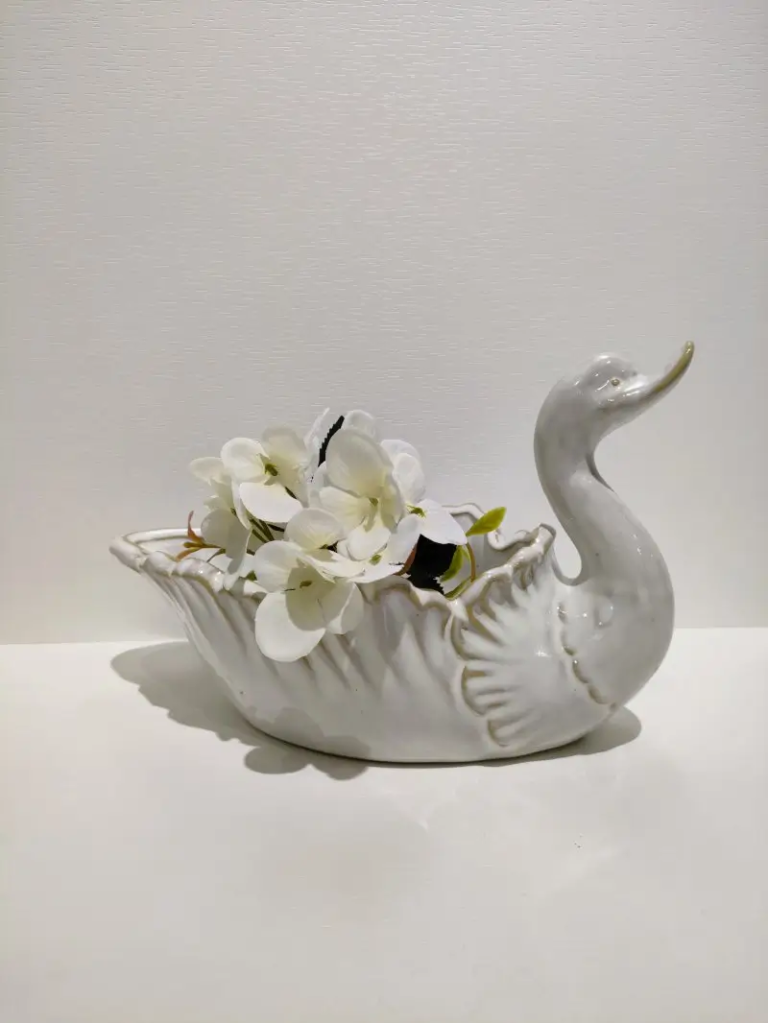 128D Swan Shaped Ceramic Storage Bowl in reactive glaze white finish with flower display application.