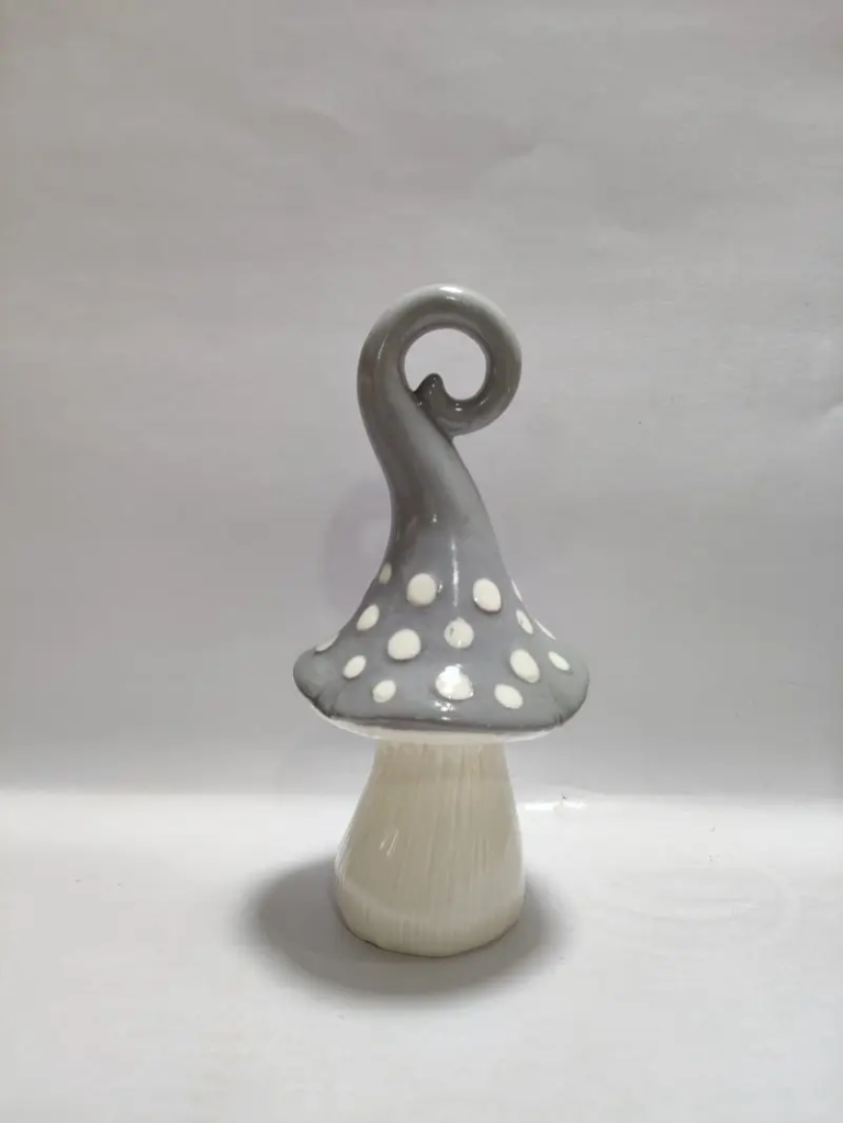 145D grey hand painted ceramic mushroom figurine with polka dot details and smooth glossy ceramic glaze.