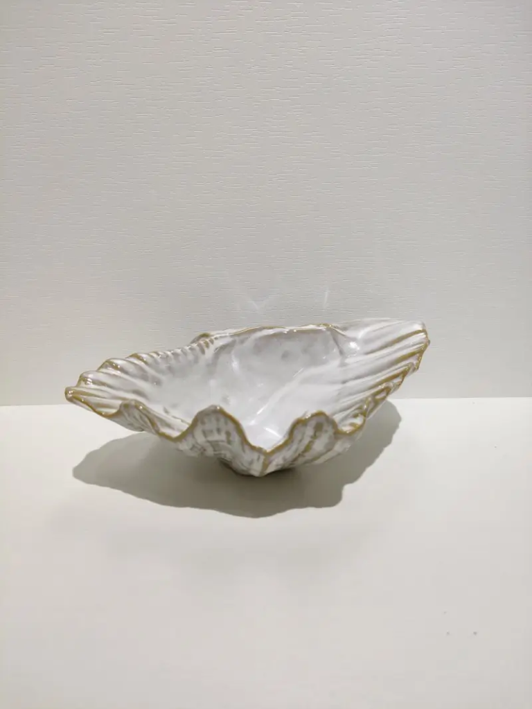 150D ceramic shell tray with ocean inspired texture, designed as a decorative tray and functional tabletop accent for modern interior spaces.