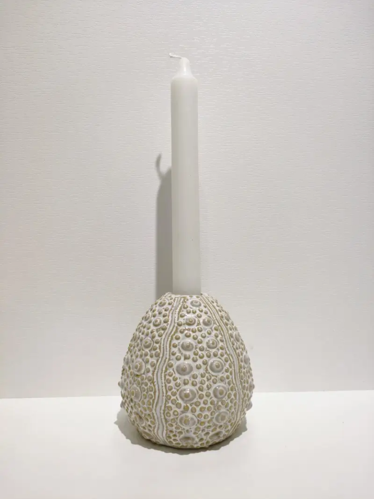 159D sea urchin ceramic candle holder with detailed ocean texture, combining functional lighting and sculptural ceramic decoration.