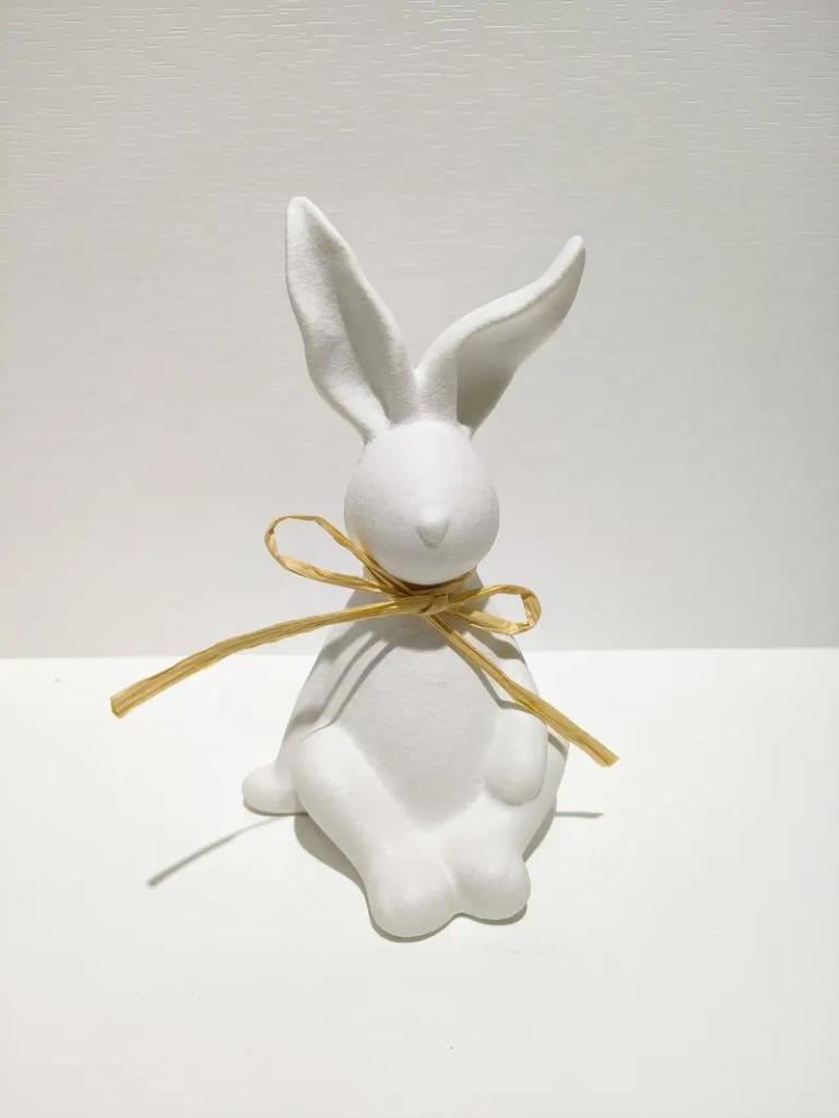 178D white ceramic rabbit figurine with seated yoga inspired design and ribbon detail, matte finish decor.
