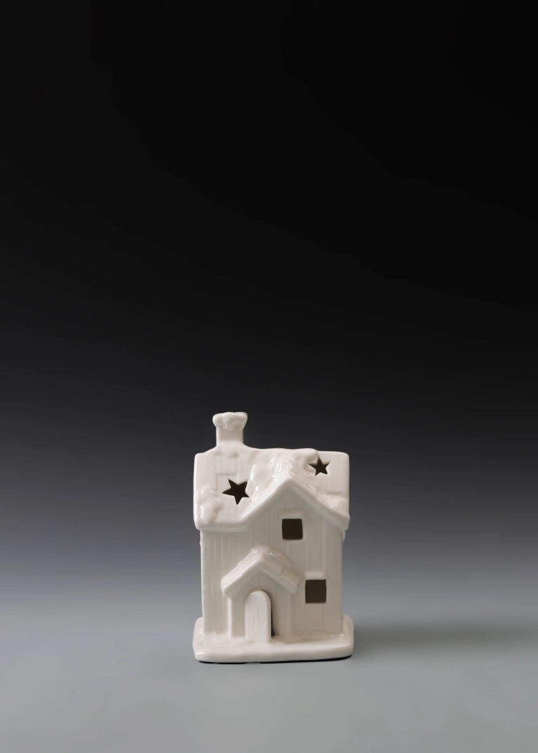 210A star arch cottage in matte white ceramic with star details and illuminated openings for holiday displays