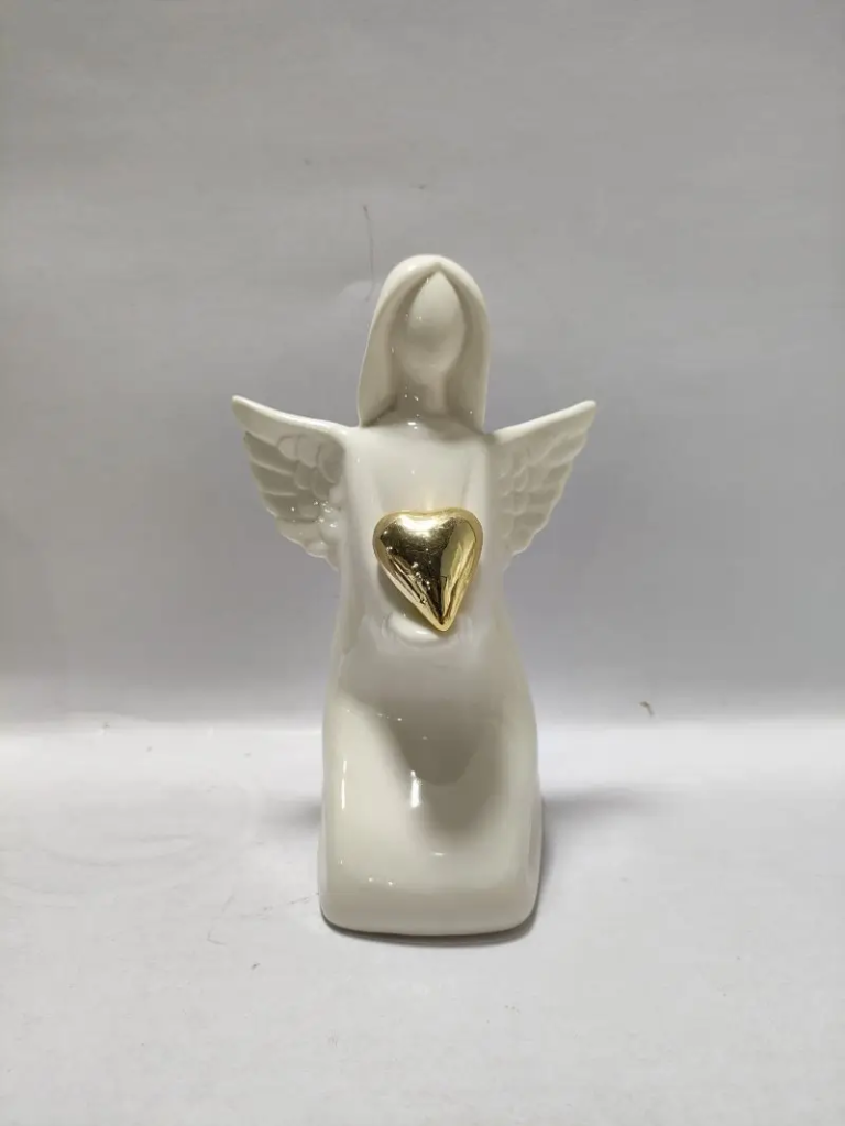 244D small glossy white ceramic angel figurine with a gold heart detail for seasonal home décor and gift display.