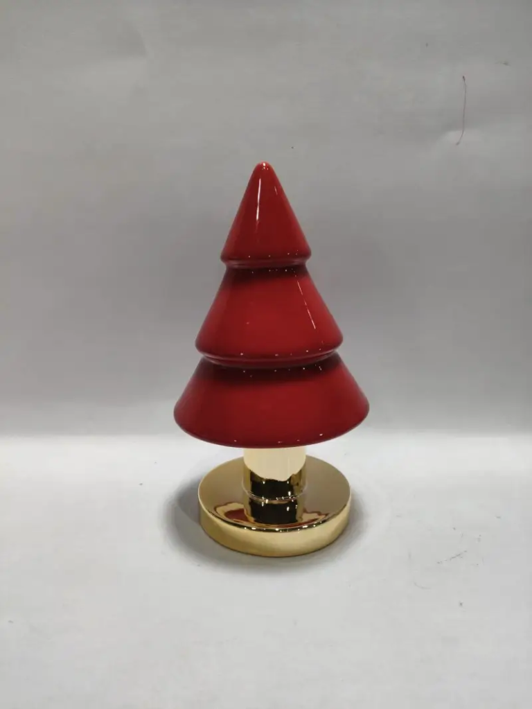 284D Illuminated Red Glazed Tiered Christmas Tree in red with built-in lighting and a gold electroplated base for warm Christmas tabletop displays.
