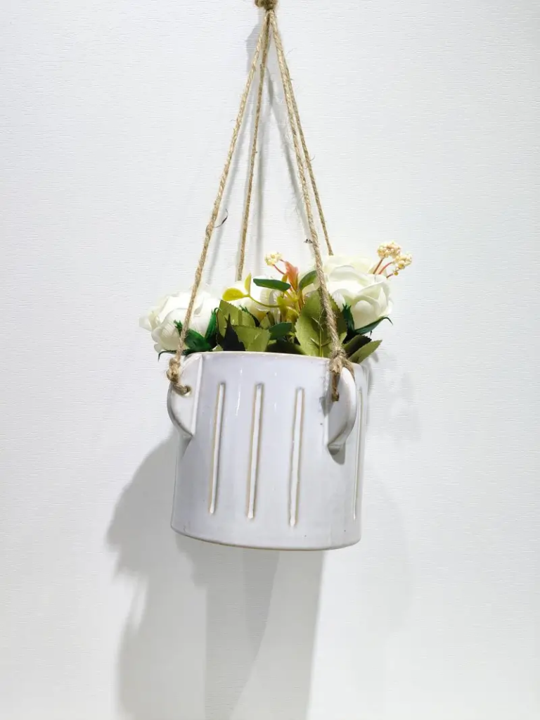 360D white modern ceramic hanging planter with refined vertical texture, designed for contemporary indoor and outdoor plant decoration.