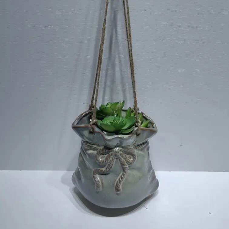 445D bow decorative hanging ceramic planter with reactive glaze cyan finish