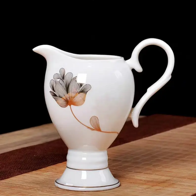 047J porcelain milk pot with coordinated floral decal decoration and refined gold-trimmed detailing.