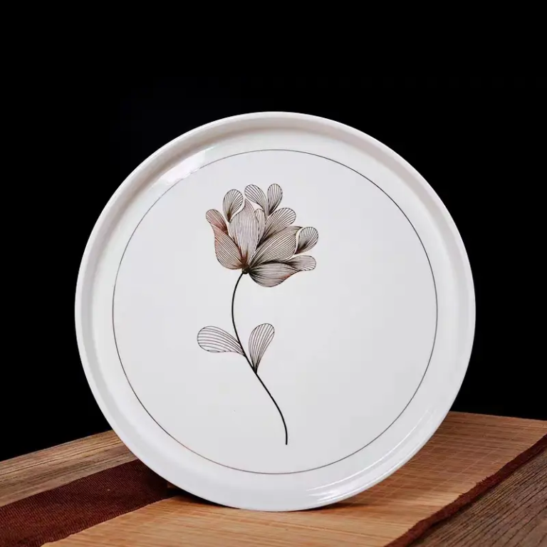 047J porcelain tea tray with coordinated floral decoration and refined gold-trimmed detailing.