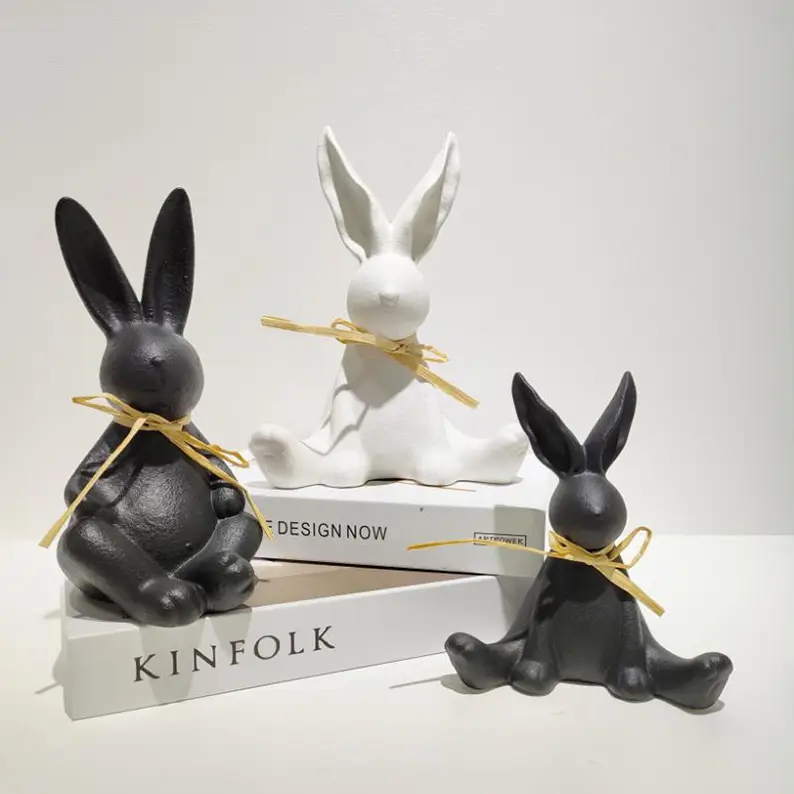 Artistic ceramic rabbit sculptures displayed together to showcase varied postures, balanced forms and modern decorative appeal