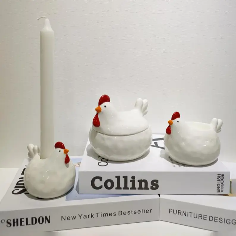 Easter ceramic display featuring chicken-shaped storage and candle holder designs with functional forms for seasonal home decoration.