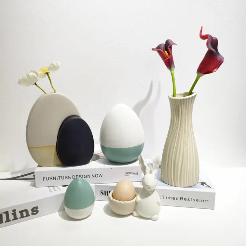 Easter ceramic home decor featuring a collection of decorative egg designs arranged for seasonal displays.