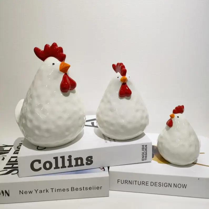 Easter white ceramic collection featuring chicken designs decorations with varied textures, finishes, and seasonal styling.
