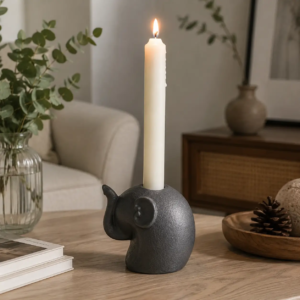 Elephant ceramic decorative figurine designed as a candle holder, combining artistic decoration with practical tabletop use