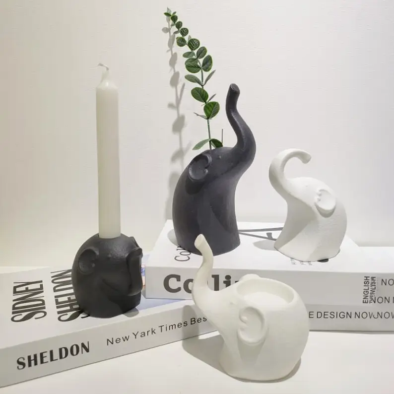 Elephant ceramic decorative figurines collection displayed with different elephant forms for modern interior decoration