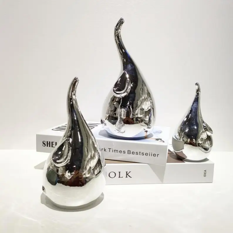 Elephant ceramic figurines designed as elegant decorative accents for living rooms, shelves, and interior spaces