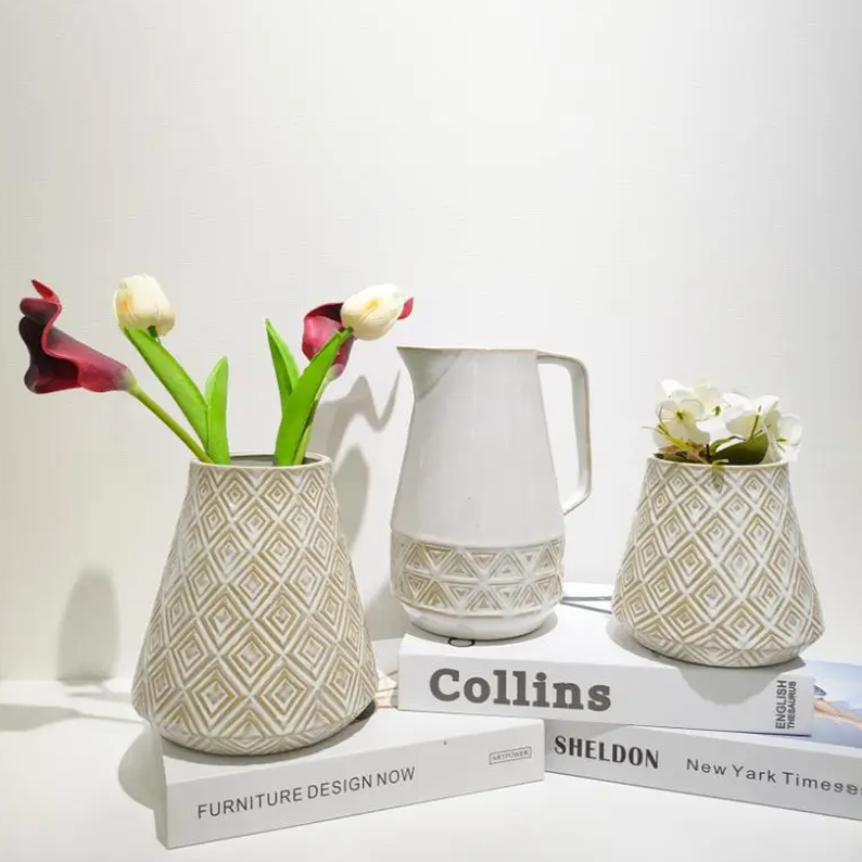 Decorative ceramic vases with geometric surface texture and high temperature fired glaze variations