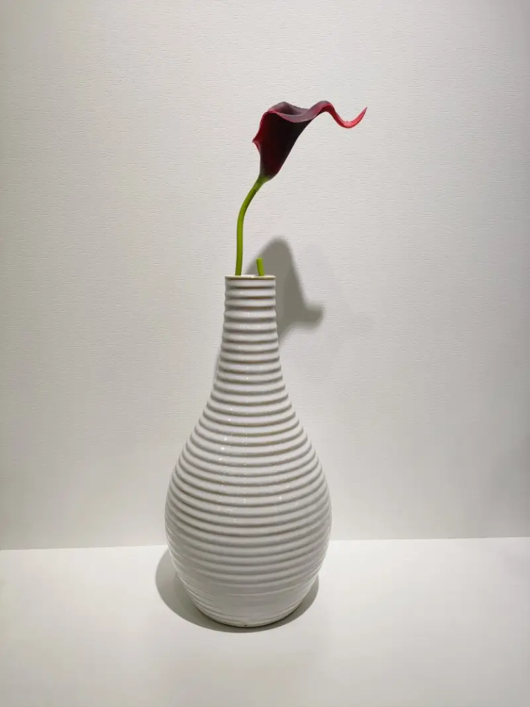 019D Linear Tall Neck Vase featuring vertical proportions and refined surface texture