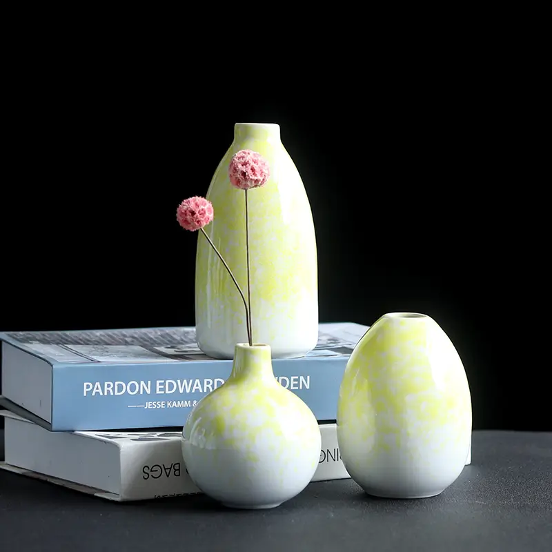 Mini gradient splash glaze ceramic vase with dried flowers displayed in a bathroom