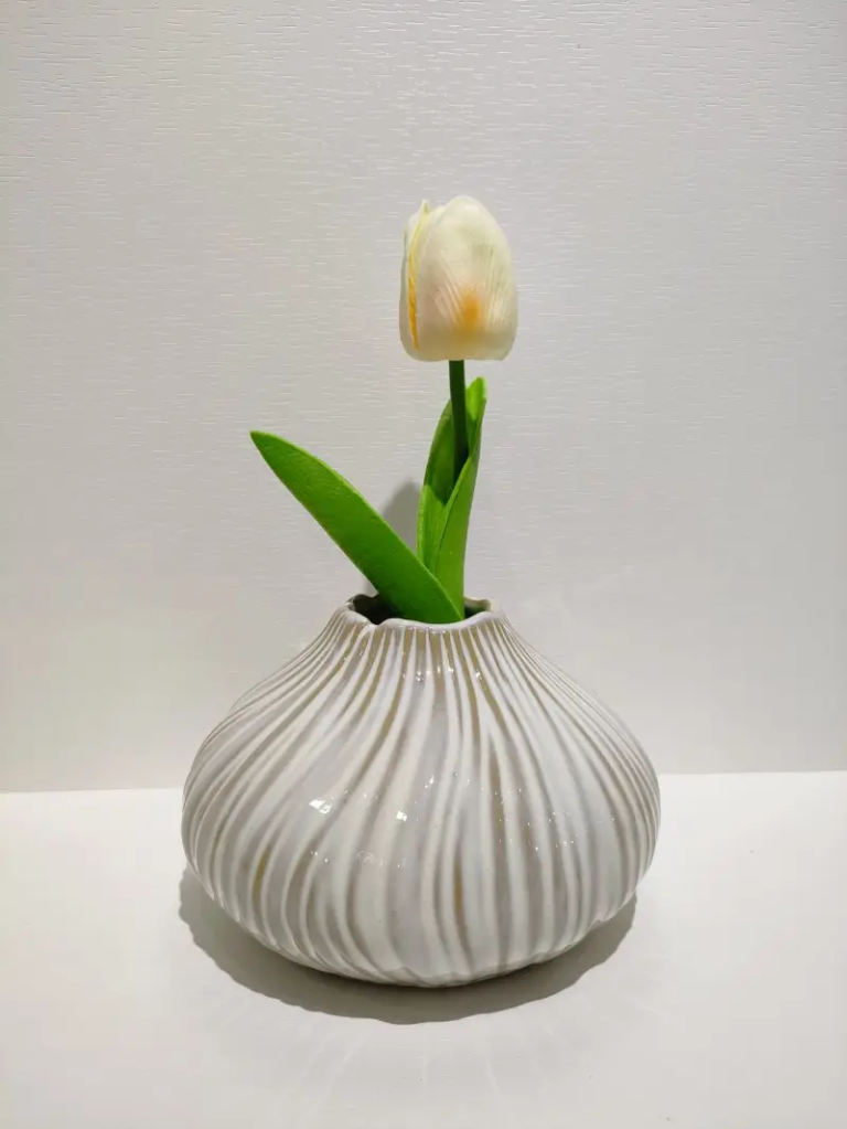 014D Mini Ripple Bud Vase with compact proportions and soft ripple texture for decorative styling