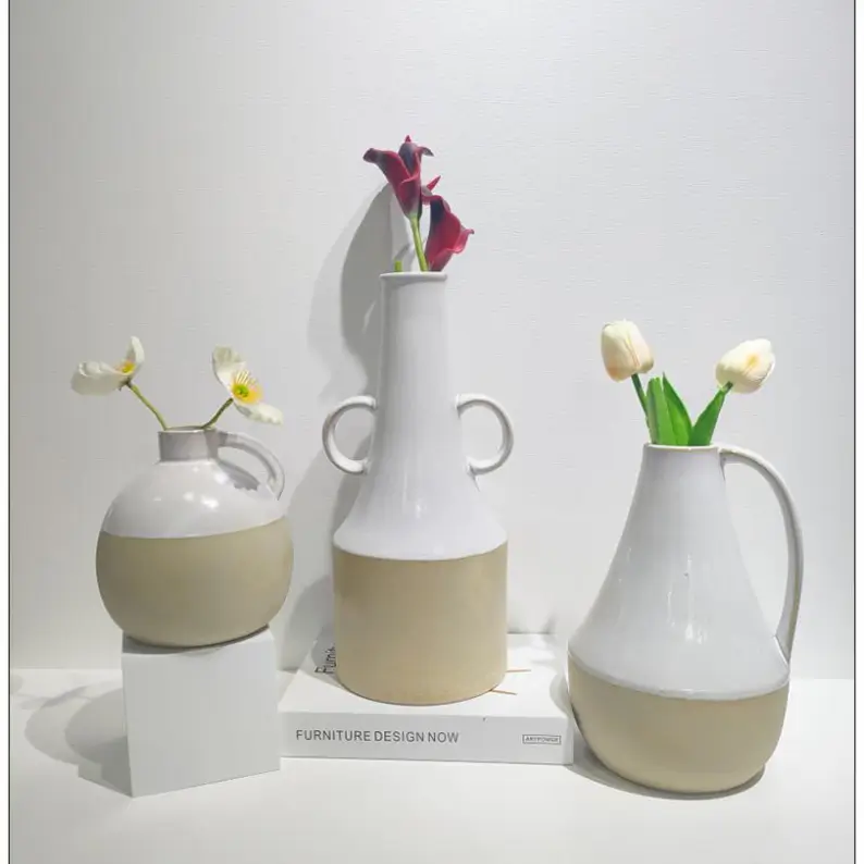 Reactive glaze ceramic vases styled in a contemporary interior setting for floral and decorative applications