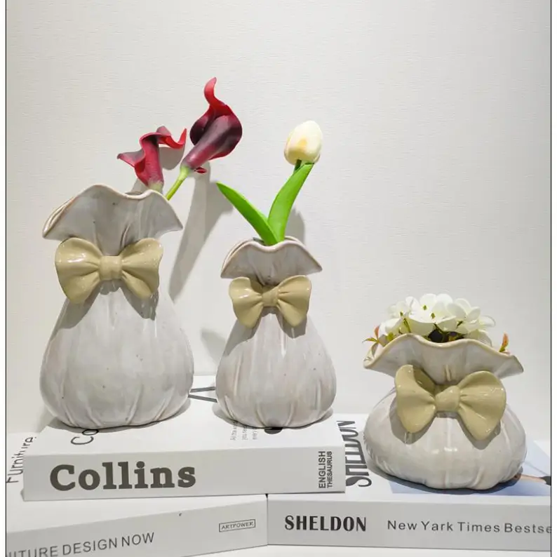 sculptural ceramic vase collection featuring reactive glaze effects, unique silhouettes and modern decorative designs