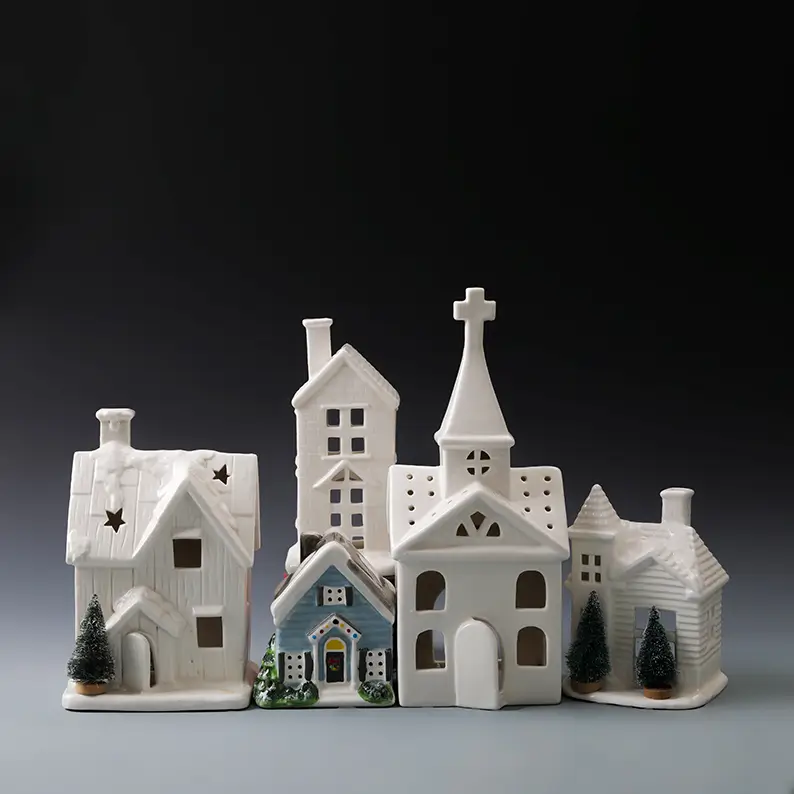 Light-up ceramic Christmas village houses in assorted white and colorful designs for seasonal and holiday decoration