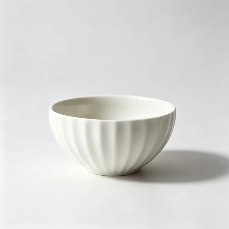 Hand-scraped ivory white ceramic bowl with matte glaze, 500ml capacity for rice and soup serving