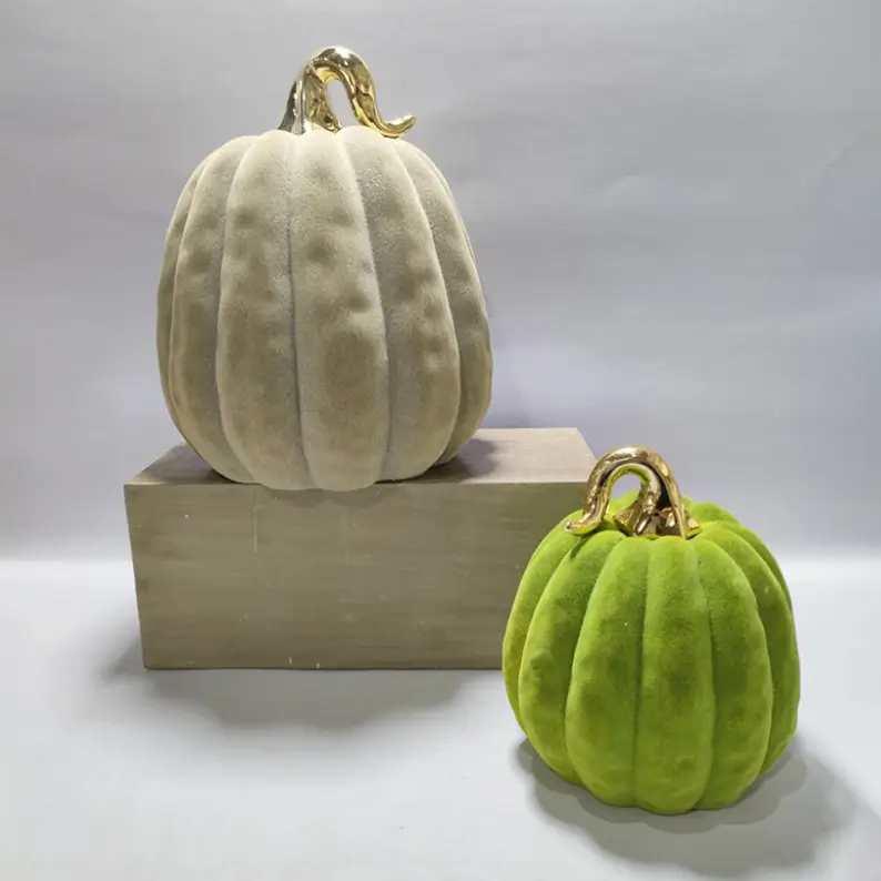 TYY2503 flocked pumpkin decorative figurines in gray and green with electroplated stems for Halloween seasonal decoration.