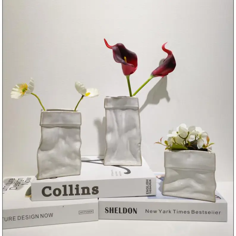 Collection of ceramic vases with different shapes and glaze effects for home decor and commercial projects