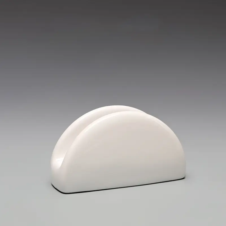 017A white ceramic napkin and hand towel holder with a clean rounded profile for hospitality table settings.